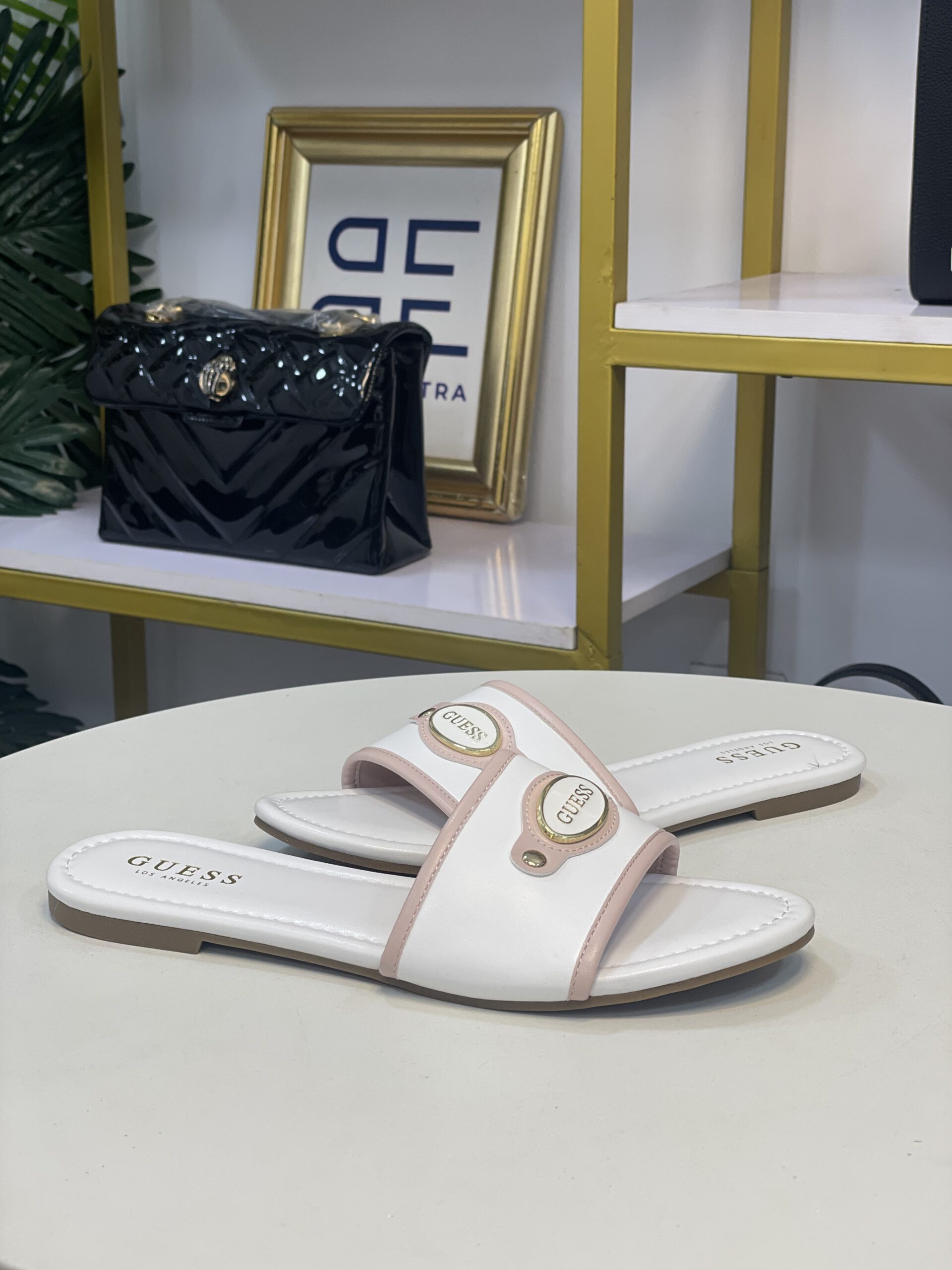 GUESS PINK AND WHITE FLATS