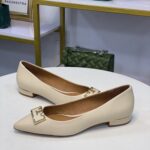 TORY BURCH CREAM FLATS